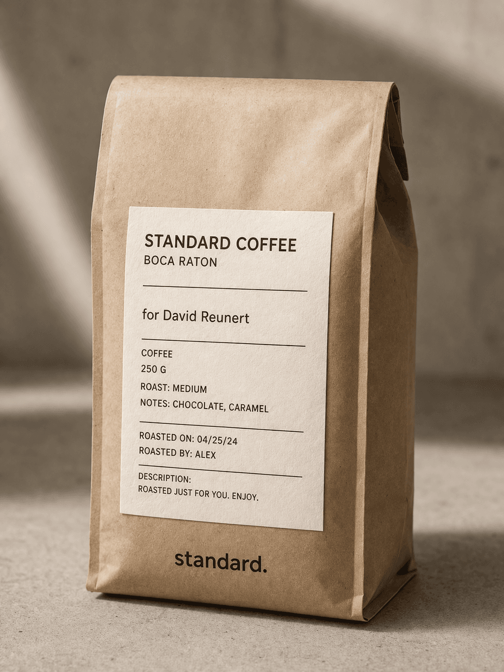 A kraft paper bag of standard. coffee with a hand-labeled tag